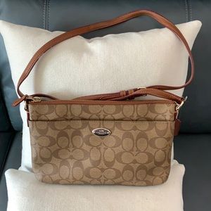 Medium brown coach cross body bag